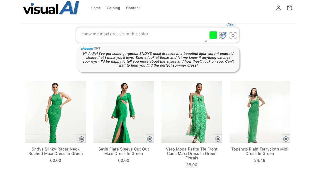 Emerald green maxi dress with a flowing design and a fitted bodice.